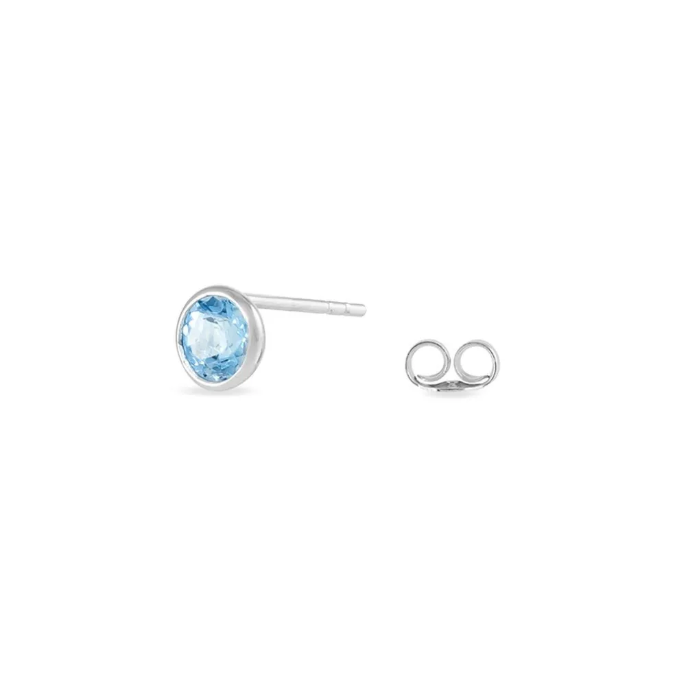 Boucles D'oreilles Puces Edy Serti Clos Or Blanc Topaze