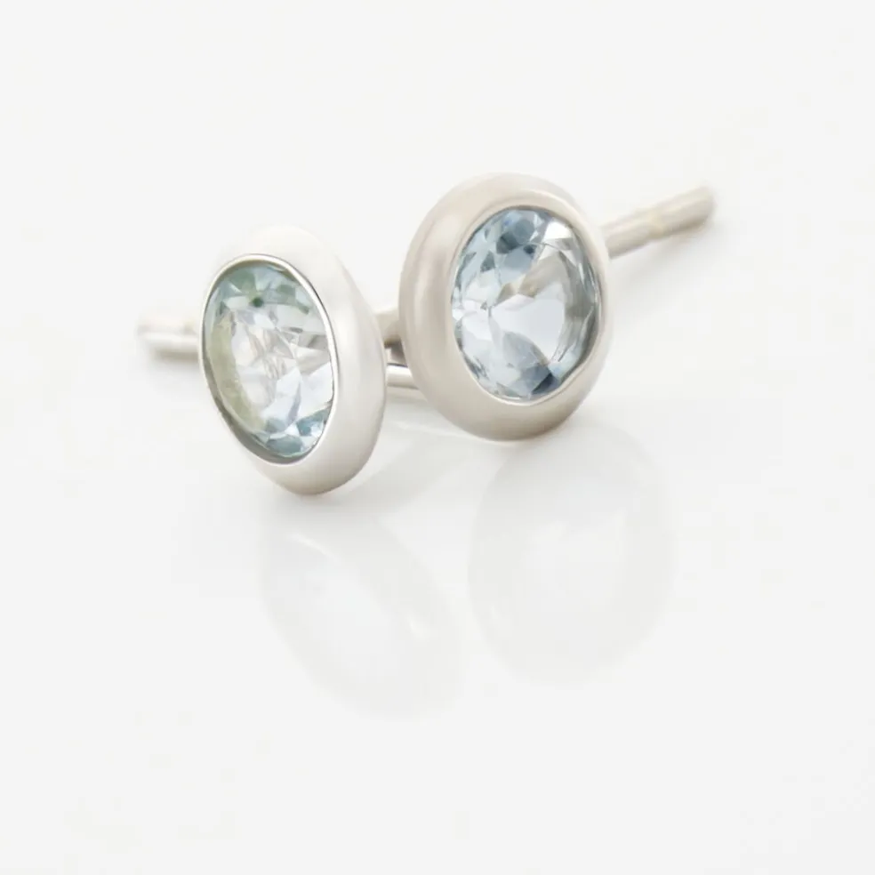 Boucles D'oreilles Puces Edy Serti Clos Or Blanc Topaze
